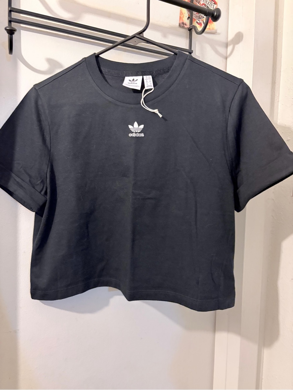 Adidas- size L- black cropped top with cuffs. NWOT.